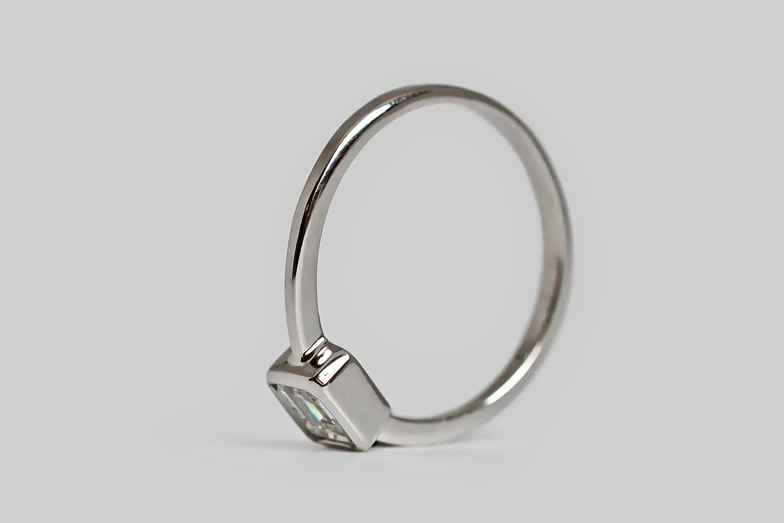 Minimal Emerald Cut Diamond Engagement Ring