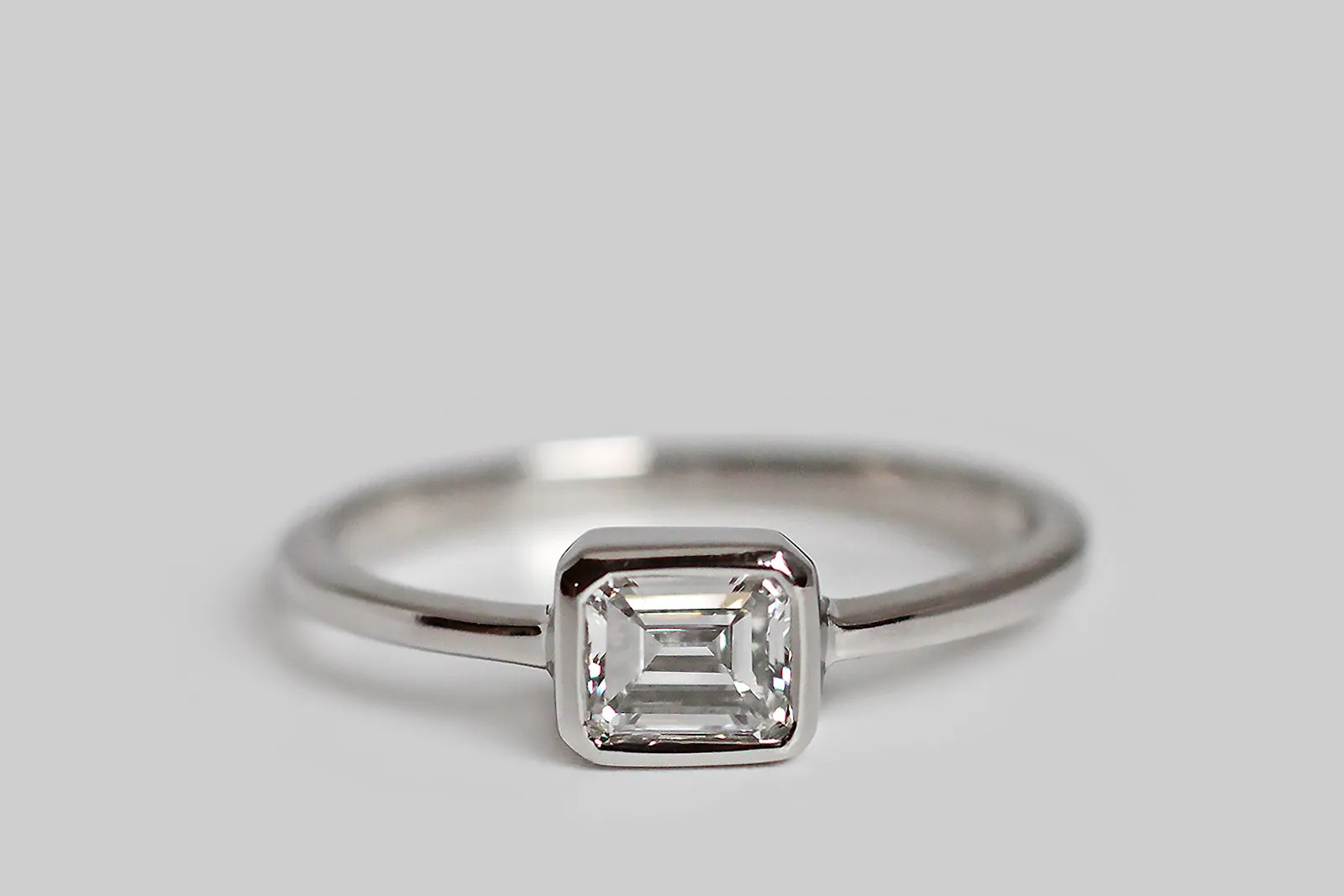 Minimal Emerald Cut Diamond Engagement Ring